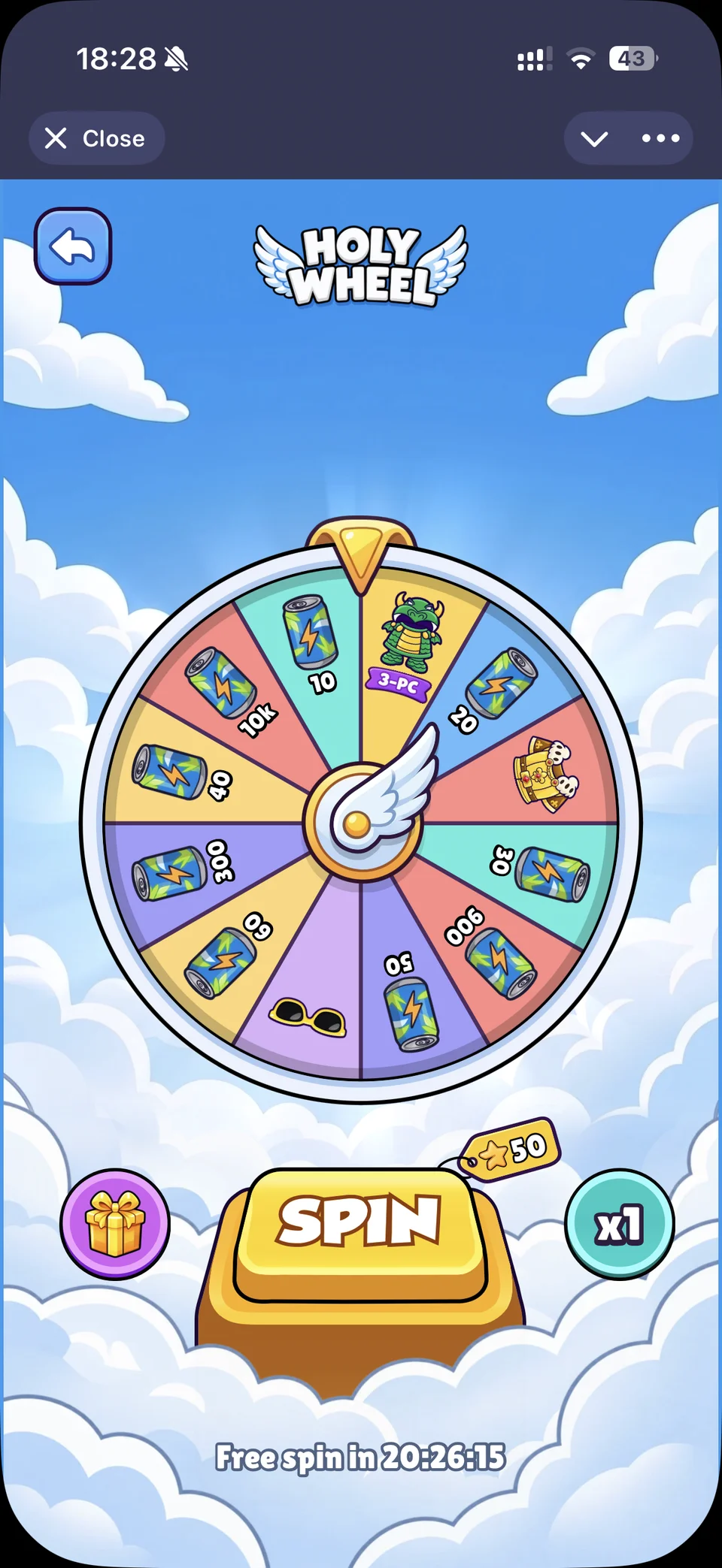 Pebbler Holy Wheel screen with a colourful prize wheel and a large Spin button